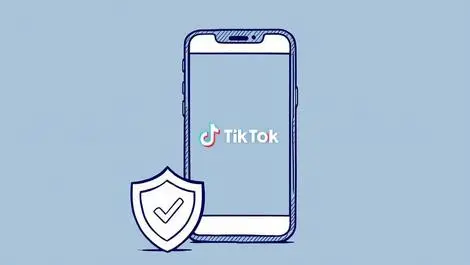 Smartphone showing tiktok logo with digital shield for ad safety